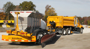 INDOT's new Tow-Plow truck is capable of clearing snow from two lanes of a divided highway at once. 
